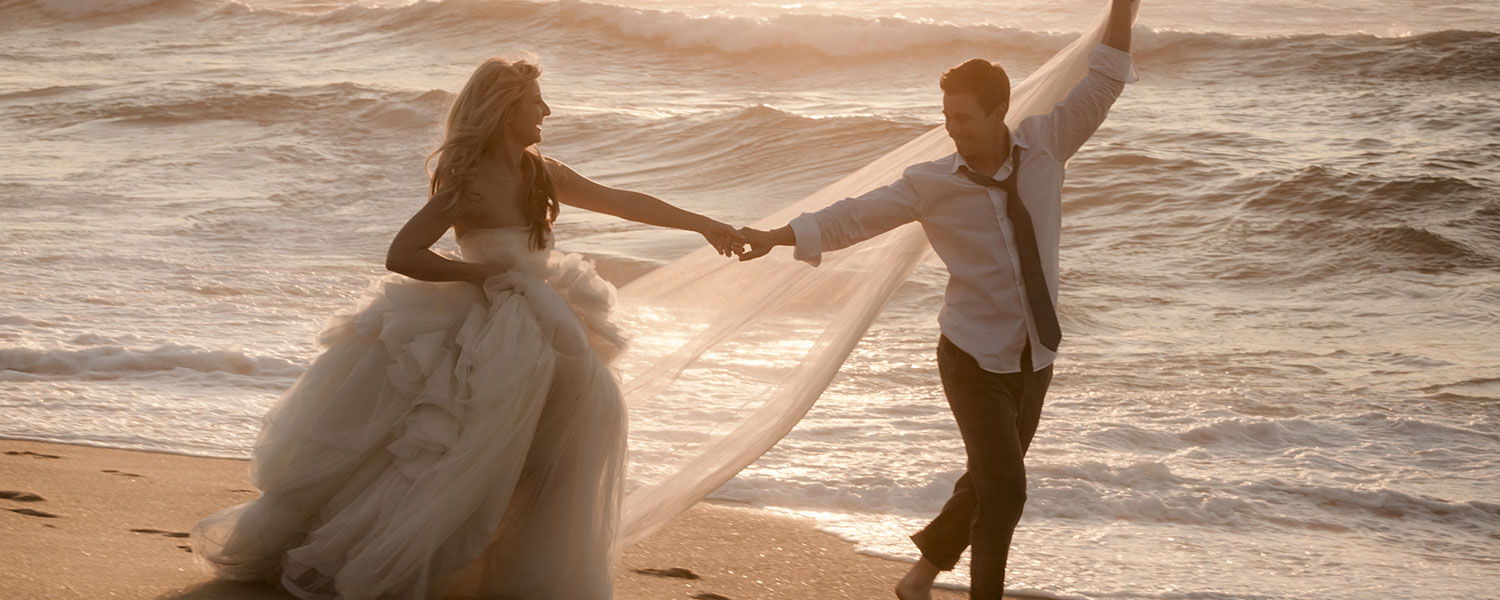 image of couple at the beach